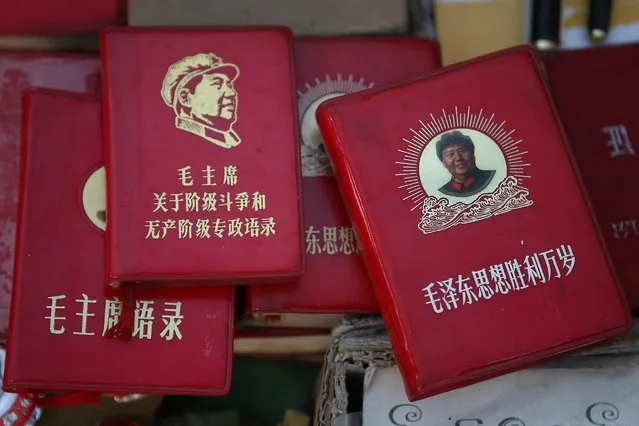 Copies of the Little Red Book are put on display for sale at Panjiayuan flea market in Beijing November 3, 2007. (Photo by Claro Cortes IV/Reuters)