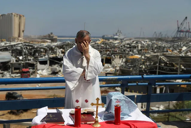 Father Michel Abboud, the President of Caritas in Lebanon, is pictured ahead of a mass, near the site of a massive explosion in Beirut's port area, Lebanon, August 16, 2020. (Photo by Goran Tomasevic/Reuters)