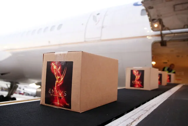 Boxes of Emmy statuettes are pictured after arriving on a United Airlines flight at Los Angeles International Airport on Tuesday, September 13, 2016.  Over 100 golden statuettes completed the annual “Flight of the Emmys” from Chicago to Los Angeles International Airport for the 68th Emmy Awards. The telecast airs live Sunday, September 18th on ABC from the Microsoft Theater in Los Angeles. (Photo by Matt Sayles/Invision for the Television Academy/AP Images)