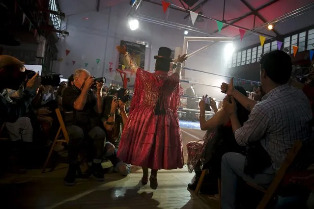 Bolivian wrestler Leonor Cordova of Bolivia, nicknamed Angela "La Simpatica" arrives for a wrestling bout against Yenny Mamani, nicknamed Martha "La Altena”, in Madrid, Spain, October 8, 2015. (Photo by Juan Medina/Reuters)