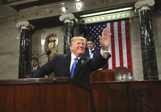 President Donald Trump arrives to deliver his first State of the Union Address to a joint session of Congress in the House chamber of the U.S. Capitol Tuesday, January 30, 2018 in Washington. (Photo by Win McNamee/Pool via AP Photo)