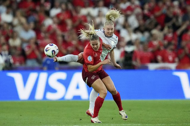 Norway's Thea Bjelde vies for the ball with Switzerland's Nadine Riesen, left, during the Euro 2025, group A, soccer match between Switzerland and Norway at St. Jakob-Park in Basel, Switzerland, Wednesday, July 2, 2025. (Photo by Martin Meissner/AP Photo)