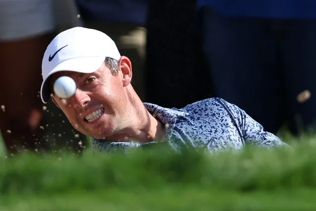 Rory McIlroy of Northern Ireland plays a shot from a greenside bunker on the 14th hole during the Final Round on Day Five of the Hero Dubai Desert Classic at Emirates Golf Club on January 30, 2023 in Dubai, United Arab Emirates. (Photo by Warren Little/Getty Images)