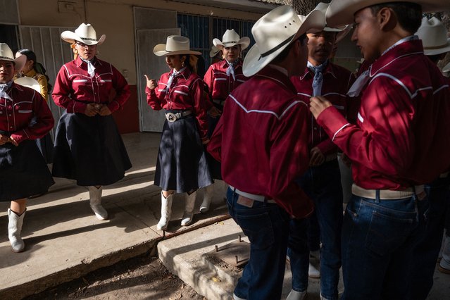 Traditional dancers prepare to participate during the “XLIII Fiesta en la Mision” celebration in La Mision town, northern Ensenada, Baja California state, Mexico on May 24, 2025. Founded in 1787 by Dominican friar Luis Sales, the Mission of San Miguel Arcangel aimed to evangelize the Kumiai people of northern Baja California. Its ruins, still visible in La Mision, mark a pivotal site in the colonial mission trail across the Californias. (Photo by Guillermo Arias/AFP Photo)