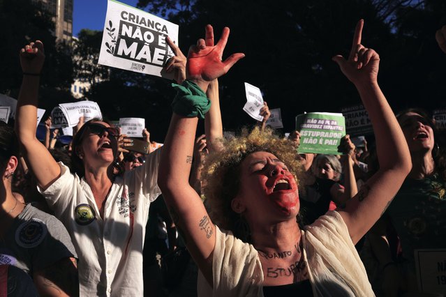 Abortion rights activists march against an anti-abortion congressional bill, along Paulista Avenue in Sao Paulo, June 15, 2024. (Photo by Ettore Chiereguini/AP Photo)