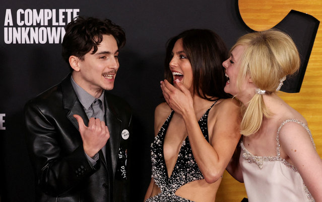 American-French actor Timothee Chalamet, American actress Monica Barbaro and American actress Elle Fanning attend a premiere of the film “A Complete Unknown” at Dolby Theatre in Los Angeles, California, U.S. December 10, 2024. (Photo by Mario Anzuoni/Reuters)