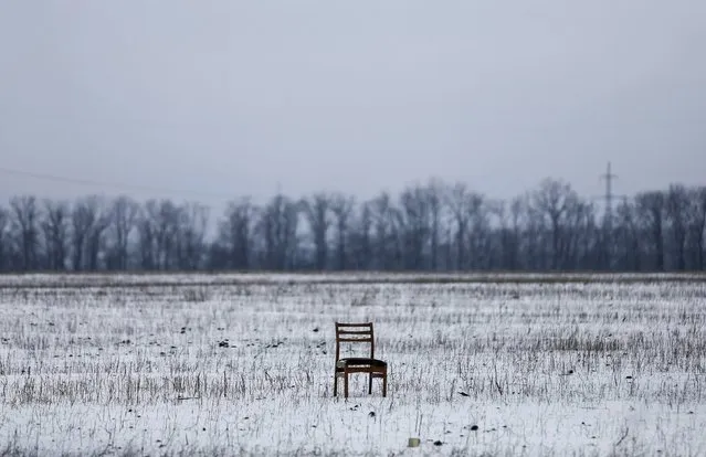 A broken chair is pictured near a checkpoint on the outskirts of Vuhlehirsk, eastern Ukraine February 10, 2015. (Photo by Maxim Shemetov/Reuters)