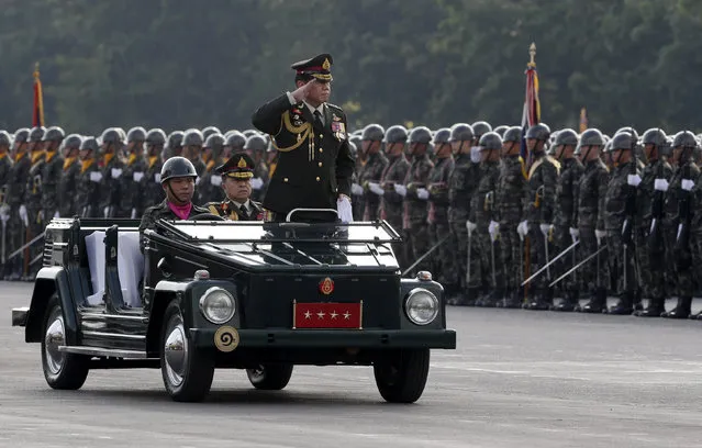 Chief of the Royal Thai Army General Thirachai Nakwanich inspects a parade on Thailand's National Armed Forces Day at the Thai Army 11th Infantry Regiment in Bangkok, Thailand January 18, 2016. (Photo by Chaiwat Subprasom/Reuters)
