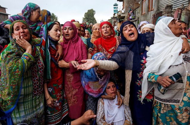 Women mourn during the funeral of Nazir Ahmad Wani, a National Conference (NC) party worker, who according to local media was killed after unknown gunmen opened fire on him in Habba Kadal area, in Srinagar, October 5, 2018. (Photo by Danish Ismail/Reuters)