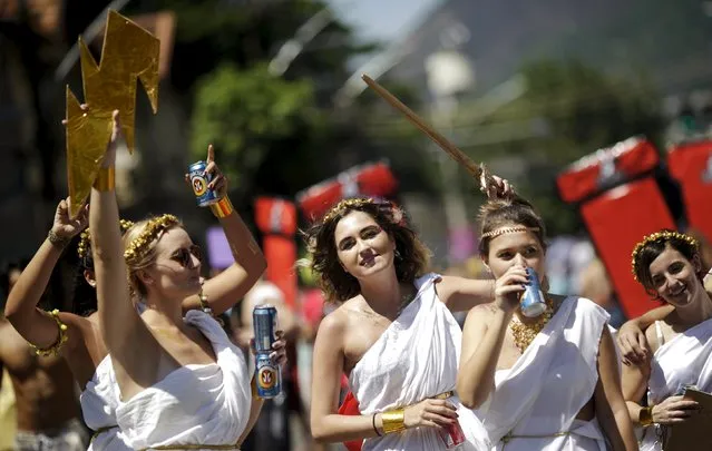 Revellers dance during the annual block party known as the “Suvaco do Cristo” (Armpit of Christ), one of the many pre-carnival parties to take place in the neighbourhoods of Rio de Janeiro, Brazil, January 31, 2016. (Photo by Ricardo Moraes/Reuters)