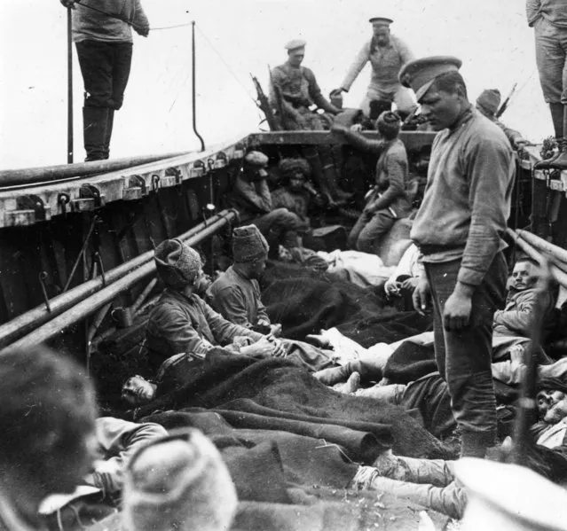 Wounded Turkish soldiers and refugees are tended  on a barge by Russians, after the fall of Trabzona to the Russian Army, 18th April 1916. (Photo by Hulton Archive/Getty Images)