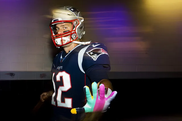 Tom Brady #12 of the New England Patriots walks through the tunnel towards the field before a game against the Kansas City Chiefs at Gillette Stadium on October 14, 2018 in Foxborough, Massachusetts. (Photo by Adam Glanzman/Getty Images)