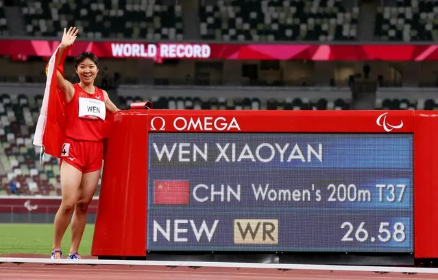 Xiaoyan Wen of Team China celebrates after winning gold in the Women’s 200m - T37 Final on day 3 of the Tokyo 2020 Paralympic Games at on August 27, 2021 in Tokyo, Japan. Wen set a new world record with her timing of 26.58 seconds. (Photo by Ivan Alvarado/Reuters)