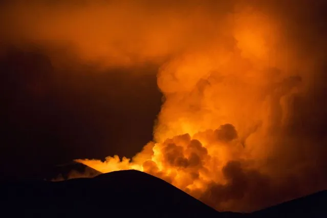 Smoke billows from the Plosky Tolbachik volcano. (Photo by Denis Budkov/Caters News)