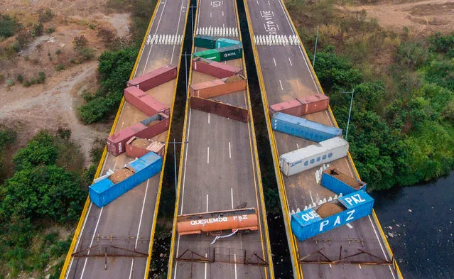 Aerial view of containers blocking the Tienditas Bridge which links Tachira, Venezuela, and Cucuta, Colombia, as seen from Cucuta, Colombia, on March 20 , 2019. (Photo by Juan Pablo Bayona/AFP Photo)