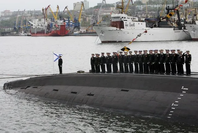The crew of the Varshavyanka class diesel submarine take part at the Victory Day parade in Vladivostok, Russia, May 9, 2015. (Photo by Reuters/Host Photo Agency/RIA Novosti)