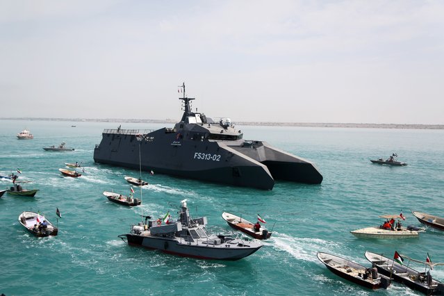 Iranian navy vessels and speedboats conduct manoeuvres during Persian Gulf National Day near the port of Bushehron April 29, 2024. The event celebrates the liberation of the country’s south from Portuguese occupation in 1622. (Photo by Fatemeh Bahrami/Anadolu Ajansı)