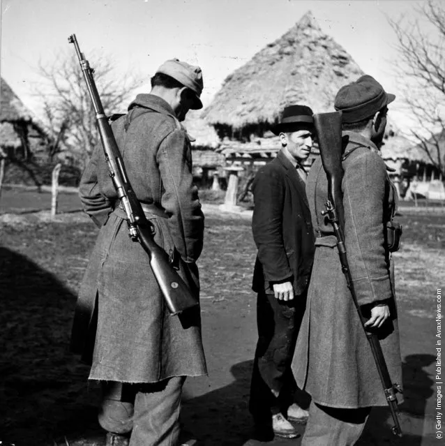 1952:  A deserter from the army being escorted by two members of the military police. Desertions are frequent in Iran where the population is not accustomed to organised militarism