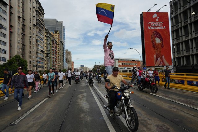 Supporters of Venezuelan opposition demonstrate following the announcement by the National Electoral Council that Venezuela's President Nicolas Maduro won the presidential election, in Caracas, Venezuela on July 29, 2024. (Photo by Alexandre Meneghini/Reuters)