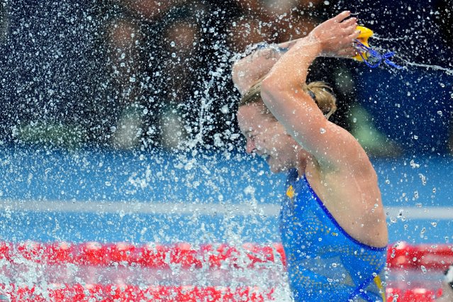 Sarah Sjoestroem of Sweden, celebrates after winning the women's 100-meter freestyle final at the 2024 Summer Olympics, Wednesday, July 31, 2024, in Nanterre, France. (Photo by Ashley Landis/AP Photo)