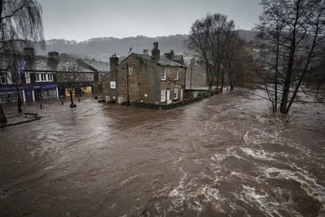 Floods in West Yorkshire, UK, by Steve Morgan. On Boxing Day 2015, a thriving former mill town in the Calder valley, Hebden Bridge, was flooded. Sirens echoed around the valley at 7.30am alerting sleeping residents to the rising waters about to engulf the town. (Photo by Steve Morgan/2016 Atkins CIWEM Environmental Photographer of the Year)