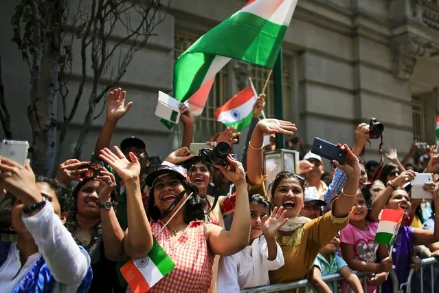Spectators celebrate the 35th India Day Parade in New York August 16, 2015. (Photo by Eduardo Munoz/Reuters)