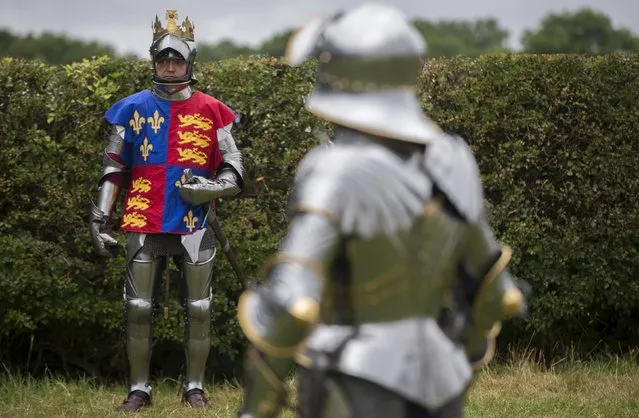 Historical re-enactor Andreas Wenzell dresses as Britain's King Richard the third in a living history camp during an anniversary event for the Battle of Bosworth near Market Bosworth in central Britain, August 23, 2015. (Photo by Neil Hall/Reuters)