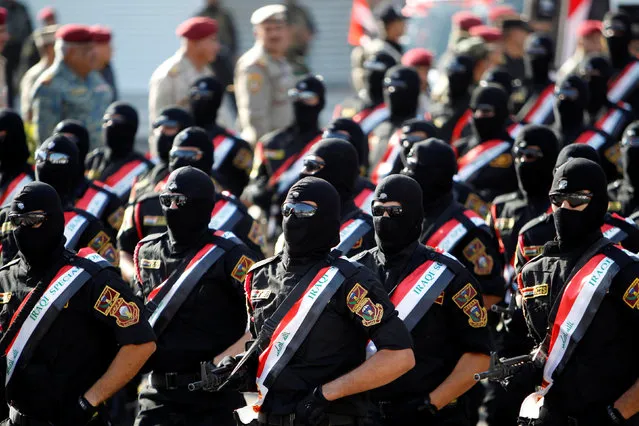 Members of the Iraqi armed forces take part in a military parade at Tahrir Square in central Baghdad, Iraq, July 14, 2016. (Photo by Khalid al Mousily/Reuters)