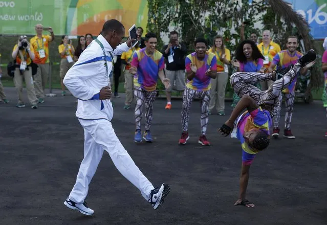 2016 Rio Olympics, Olympic Village, Rio de Janeiro, Brazil on July 30, 2016. An athlete of Gabon dances during their official welcome ceremony. (Photo by Athit Perawongmetha/Reuters)