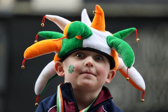 A boy reacts during the St Patrick's Day Parade in Manchester, on March 16, 2025. (Photo by Temilade Adelaja/Reuters)