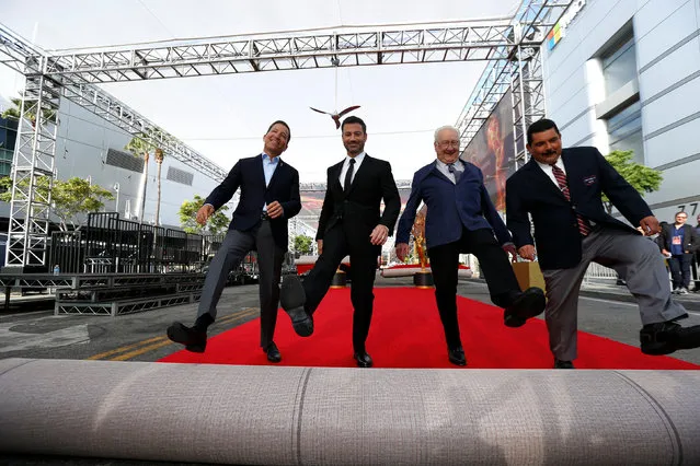 Show host Jimmy Kimmel (2nd L) along with Television Academy Chairman and CEO Bruce Rosenblum (L), executive producer Don Mischer (2nd R) and television personality Guillermo Rodriguez roll out the red carpet during preparations for the 68th Emmy Awards at Microsoft Theater in Los Angeles, California U.S., September 14, 2016. (Photo by Mario Anzuoni/Reuters)