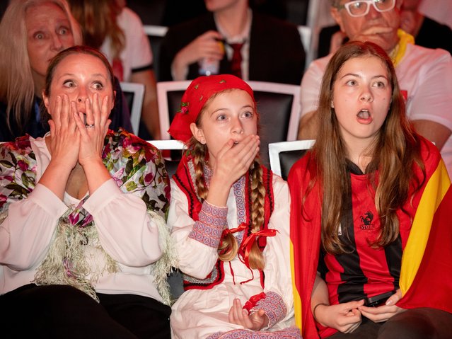 Fans react during a live watch party during the grand-final at the 69th Eurovision Song Contest (ESC) in Basel, Switzerland at Marana Auditorium in Sydney, Australia, 18 May 2025. (Photo by Sitthixay Ditthavong/EPA/EFE)