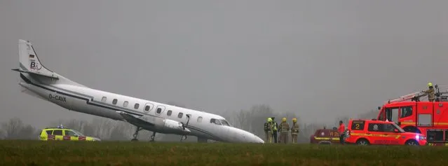 The scene of a plane crash at Dublin Airport after the front wheel of the Bin Air aircraft buckled on landing causing the accident on the runway, on March 7, 2013. (Photo by Niall Carson/PA Wire)