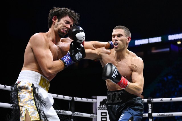Joey Essex punches Joao Barbosa during the Middleweight fight between Joey Essex and Joao Barbosa during the Misfits 22 - Ring of Thrones fight night at AO Arena on August 30, 2025 in Manchester, England. (Photo by Ben Roberts Photo/Getty Images)
