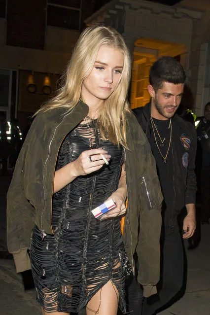 Lottie Moss left Tape night club in London on October 14, 2016 with a bit of detritus attached to her shoe. She also left with reality TV duo Vas J Morgan and Alex Mytton. Lottie was also carrying a Moschino F16 (Quitting) Fashion Kills Cigarette Pack Purse. (Photo by Splash News and Pictures)