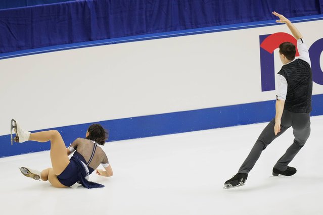 Pavel Kovalev of France watches as his partner Camille Kovalev falls while performing in the pairs' short program at the ISU Grand Prix of Figure Skating – NHK Trophy in Kadoma, east of Osaka, western Japan, Friday, November 7, 2025. (Photo by Hiro Komae/AP Photo)