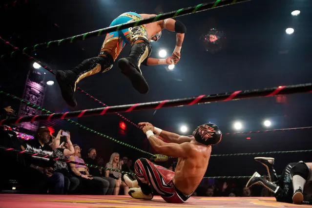 Lucha Libre wrestlers perform during the Lucha VaVoom spectacle “Cinco de Mayan” at The Mayan theater in Los Angeles, California, USA, late 04 May 2023 (issued 05 May 2023). The Lucha VaVoom presents Lucha Libre wrestling spectacles and mixes them with burlesque show elements. (Photo by Caroline Brehman/EPA/EFE)