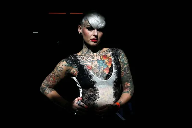 Jade Allison displays her tattoos during the ninth London Tattoo Convention on September 27, 2013. (Photo by Stefan Wermuth/Reuters)