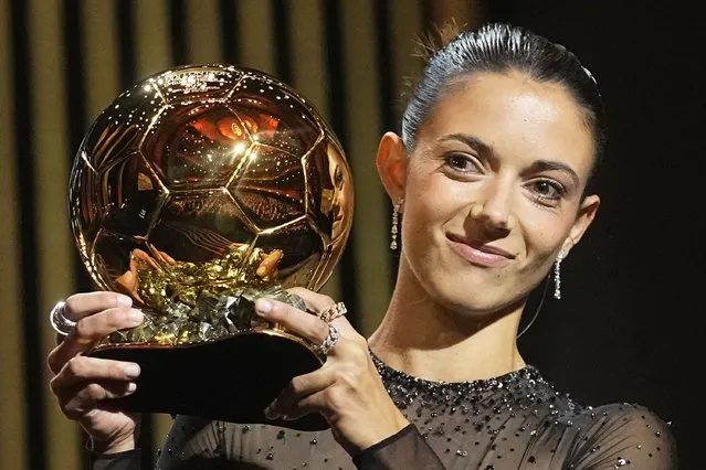 FC Barcelona's and Spain's national team's midfielder Aitana Bonmati holds the trophy as she receives the 2023 Women's Ballon d'Or award during the 67th Ballon d'Or (Golden Ball) award ceremony at Theatre du Chatelet in Paris, France, Monday, October 30, 2023. (Photo by Michel Euler/AP Photo)