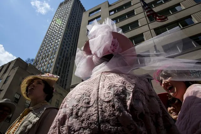 People take part in the Easter Parade and Bonnet Festival along 5th Avenue in New York City April 5, 2015. (Photo by Eric Thayer/Reuters)