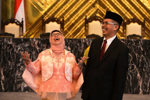 The new deputy governors of Indonesia's Central Bank, Rosmaya Hadi (L) and Sugeng, react after taking their ceremonial oath in Jakarta, indonesia, January 6, 2017 in this photo taken by Antara Foto. (Photo by Widodo S. Jusuf/Reuters/Antara Foto)