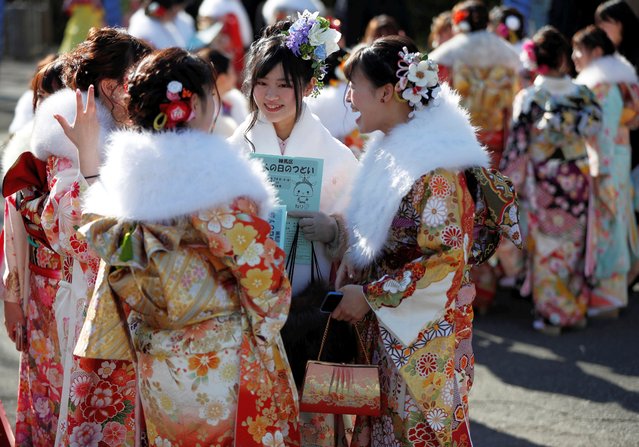 Japanese women wearing kimonos attend their Coming of Age Day celebration ceremony at Toshimaen amusement park in Tokyo, Japan on January 14, 2019. (Photo by Issei Kato/Reuters)