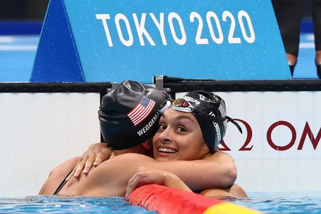 Gold medalist Mallory Weggemann and silver medalist Ahalya Lettenberger of Team United States react after competing in the women's 200m individual medley - SM7 final on day 3 of the Tokyo 2020 Paralympic Games at Tokyo Aquatics Centre on August 27, 2021 in Tokyo, Japan. (Photo by Marko Djurica/Reuters)