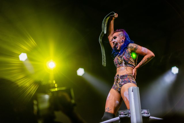 Pro wrestler Erika Reid aka “The Dreamtime Voodoo Witch” holds aloft her winner’s belt after defeating Lizzy Evo in the Oceania pro wrestler women’s championship in Selkirk Stadium in Ballarat, Australia on 12 April, 2024. (Photo by Steve Womersley/The Guardian)