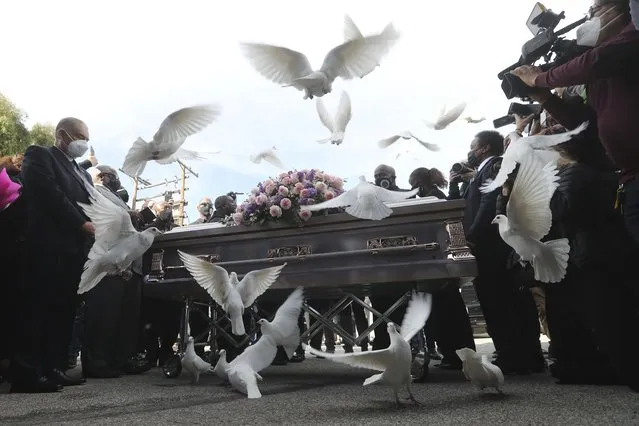 Forty doves are released at the funeral of 14-year-old Valentina Orellana-Peralta, killed on Dec. 23, by a LAPD police officer's stray bullet while shopping with her mother, at the City of Refuge Church in Gardena, Calif., Monday, January 10, 2022. (Photo by David Swanson/AP Photo)