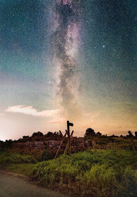 An impressive Milky Way is seen from the country side of Hexham in Northumberland, United Kingdom on August 22, 2023. The recent clear skies, combined with little light pollution in the area, are currently offering up spectacular star scapes. (Photo by Lewis Brown/Story Picture Agency)