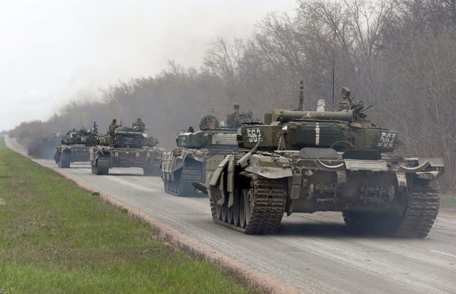 Tanks of pro-Russian troops drive along a road during Ukraine-Russia conflict near the southern port city of Mariupol, Ukraine on April 17, 2022. (Photo by Alexander Ermochenko/Reuters)