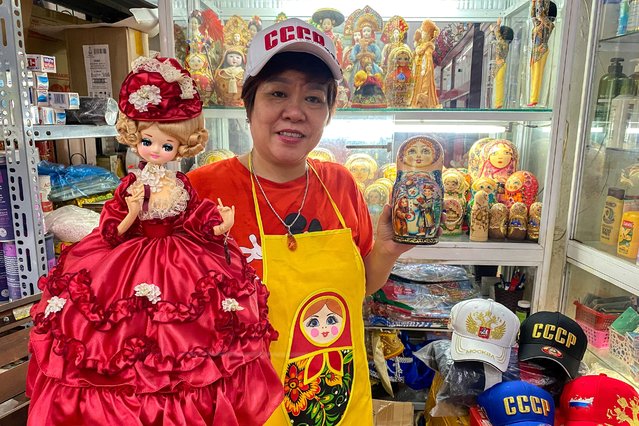 Nguyen Thi Hong Van, 55, a collector and seller of Russian souvenirs who lived and worked in Russia for 20 years, poses at her shop in Hanoi, Vietnam, on June 16, 2024. (Photo by Thinh Nguyen/Reuters)