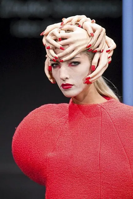 A model presents creation by Anita Zmurko-Sieradzka during a fashion event called  Fashionable East – Fashion Week in Bialystok, eastern Poland August 1, 2015. (Photo by Marcin Onyfryjuk/Reuters/Agencja Gazeta)