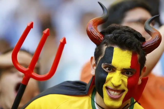 A Belgium fan waits for the 2014 World Cup quarter-finals between Argentina and Belgium at the Brasilia national stadium in Brasilia July 5, 2014. (Photo by Dominic Ebenbichler/Reuters)